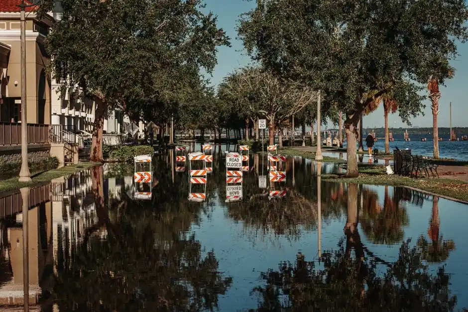 A suburban house surrounded by floodwaters after heavy rain